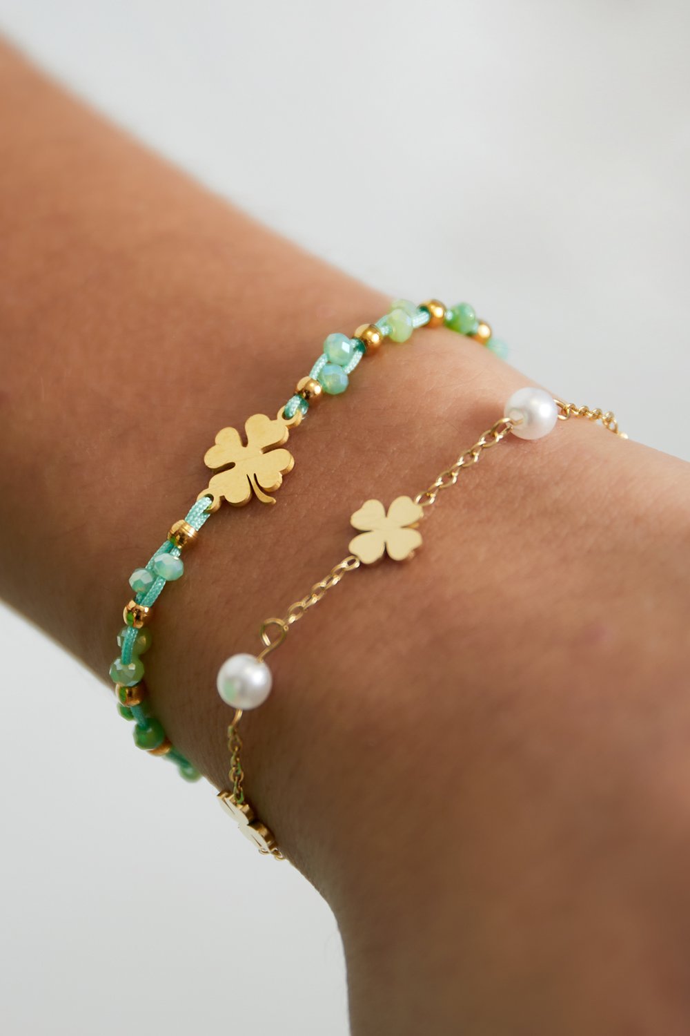 Lucky charm armband beige/goud